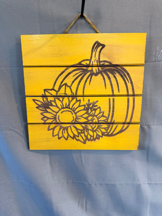 Pumpkin with sunflower